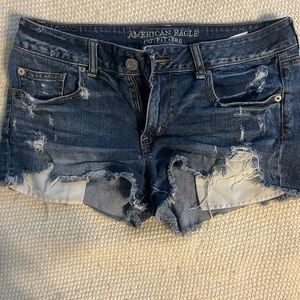 American eagle jean shorts. Shortie/stretch distressed style. Size 12.